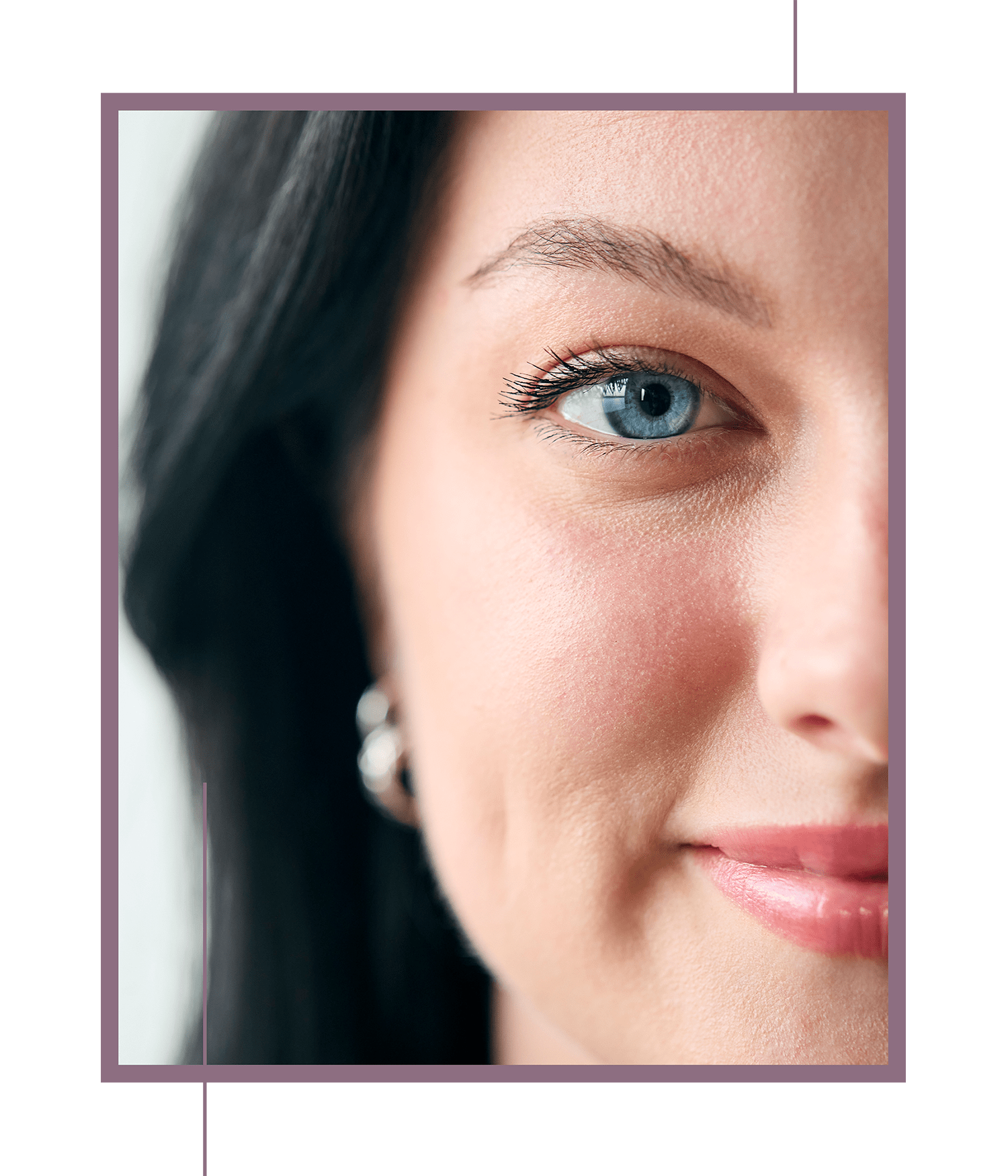 A woman with bright, beautiful blue eyes.